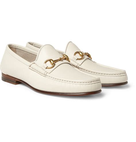 white gucci loafers men.